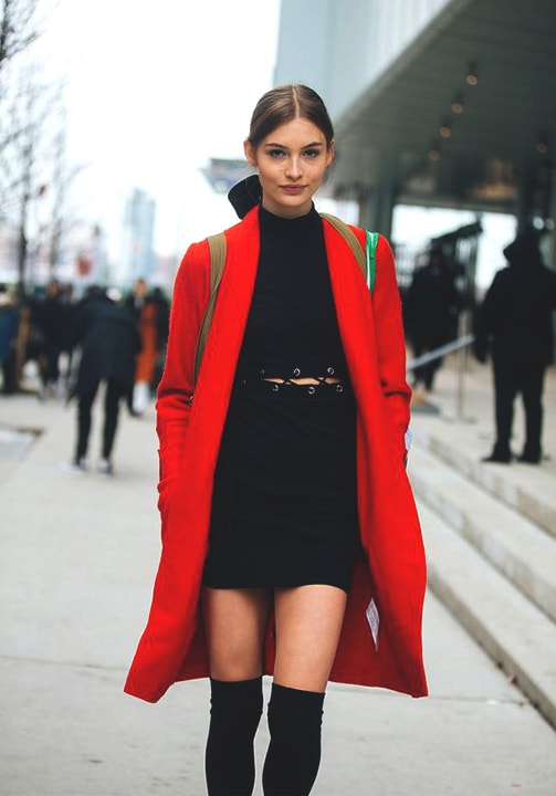 black dress with red coat