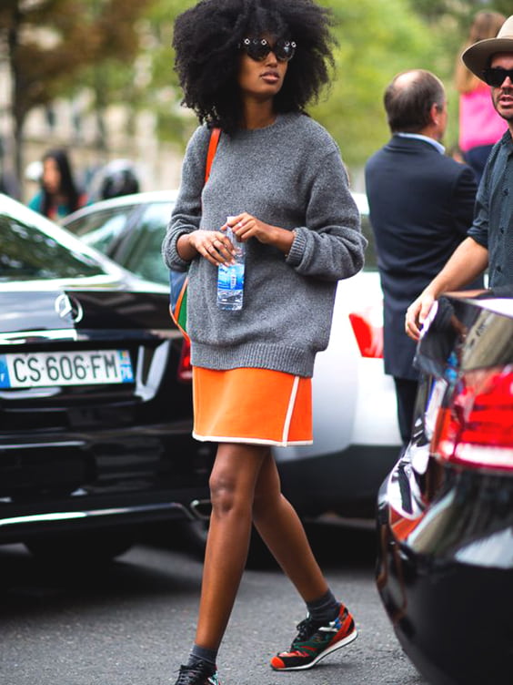 orange-sporty-skirt-grey-sweater-layered-min