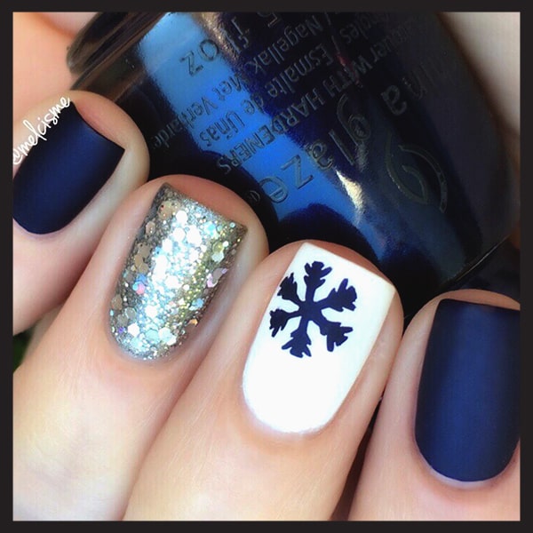 christmas-nail-art-design-ideas-navy-and-white-snowflake-nails-min