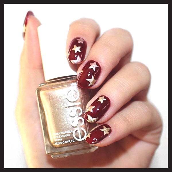 christmas-nail-art-ideas-red-and-gold-stars-nails-min