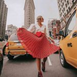 valentines-day-outfit-idea-cute-heart-shaped-belt-bag-long-red-striped-skirt