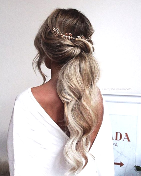 low-textured-pony-wedding-hairstyles-min