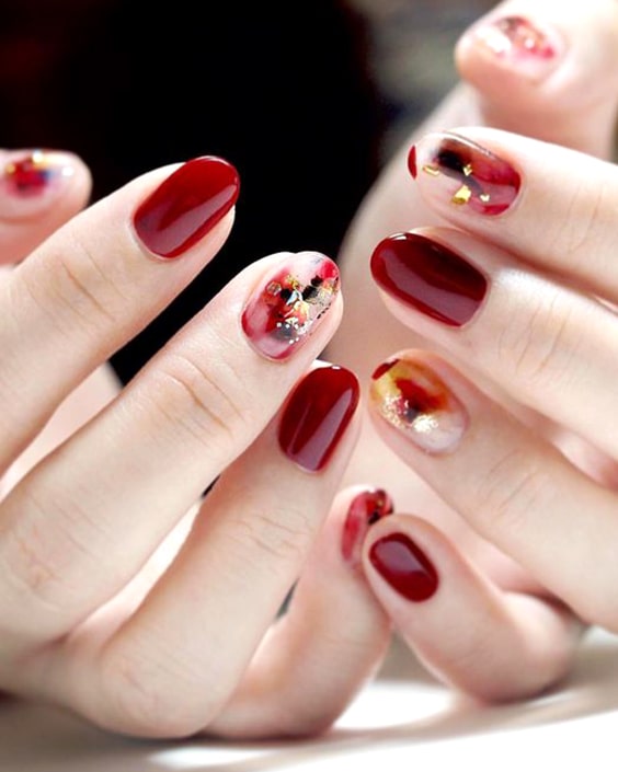 valentines-day-burgundy-abstract-nail-design-min