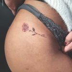 side-hip-rose-tattoo