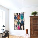 fabric-rug-hanging-wall-decor-idea